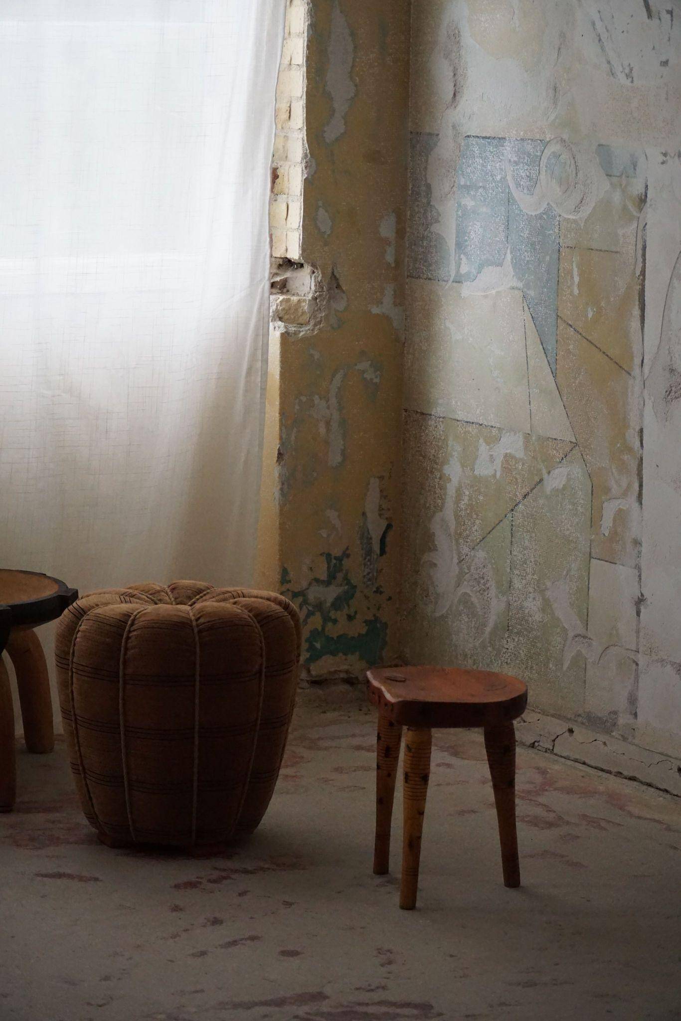 Primitive tripod stool in solid pine, modern Swedish style, from the 1950s.