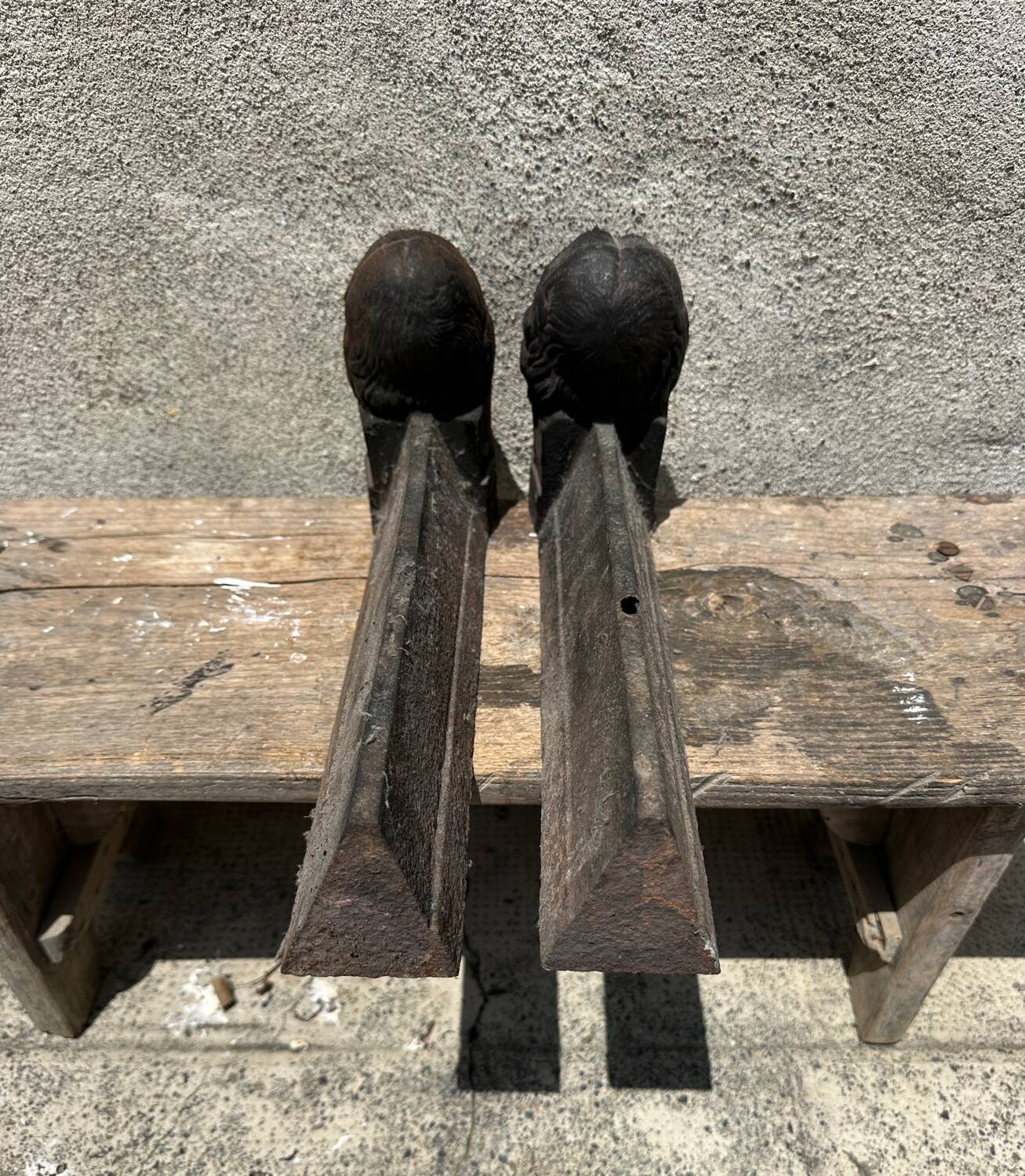 Pair of antique cast iron fireplace andirons, male and female couple