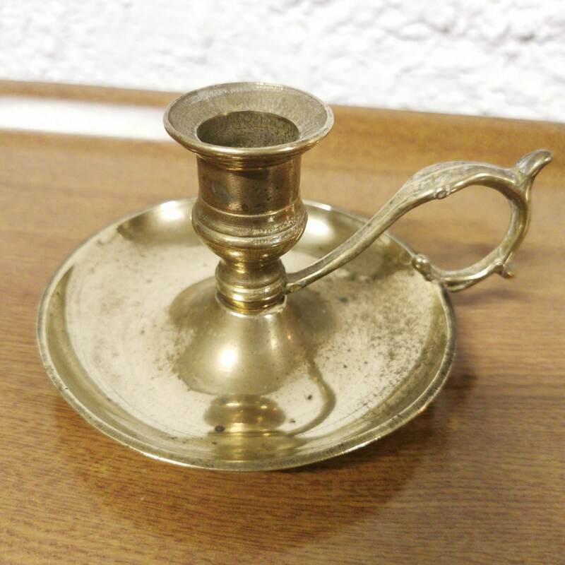 Brass poucier candle holder