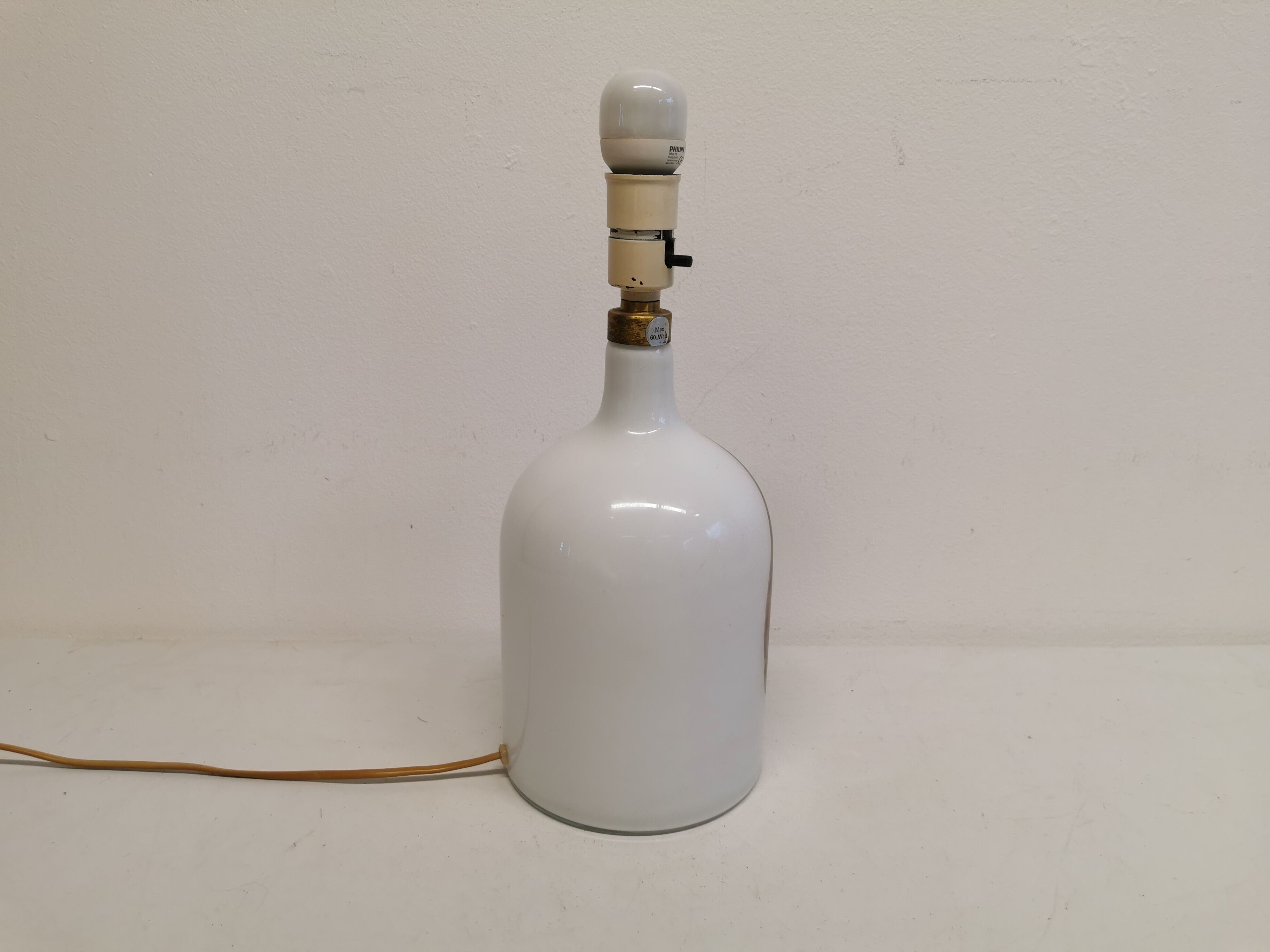 Older table lamp in milky white opaline glass with purple pattern / details from danish holmegaard.