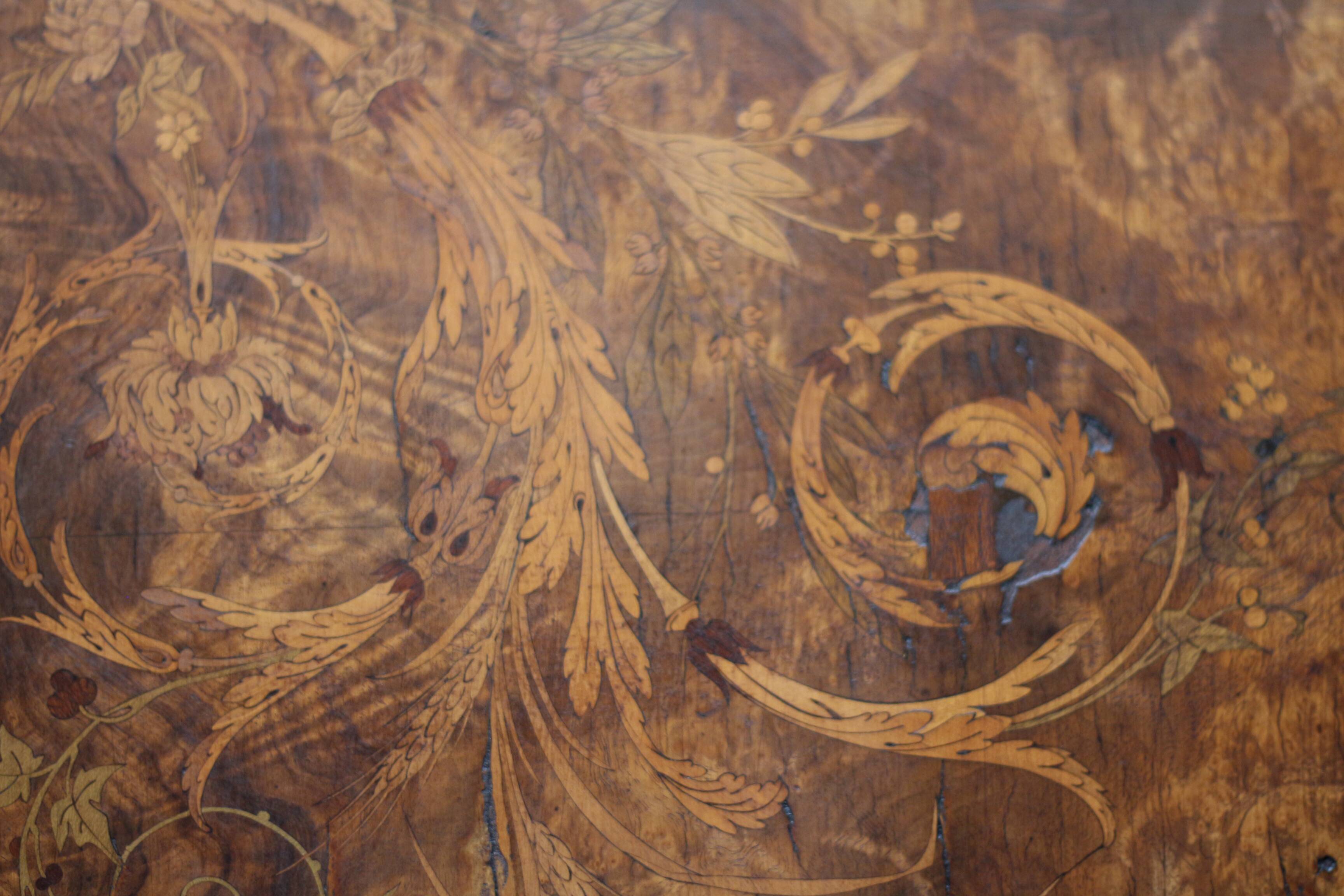Superb Napoleon III table. Marquetry top and gilded bronzes.