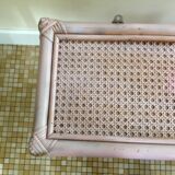 Pink rattan and cane shelf