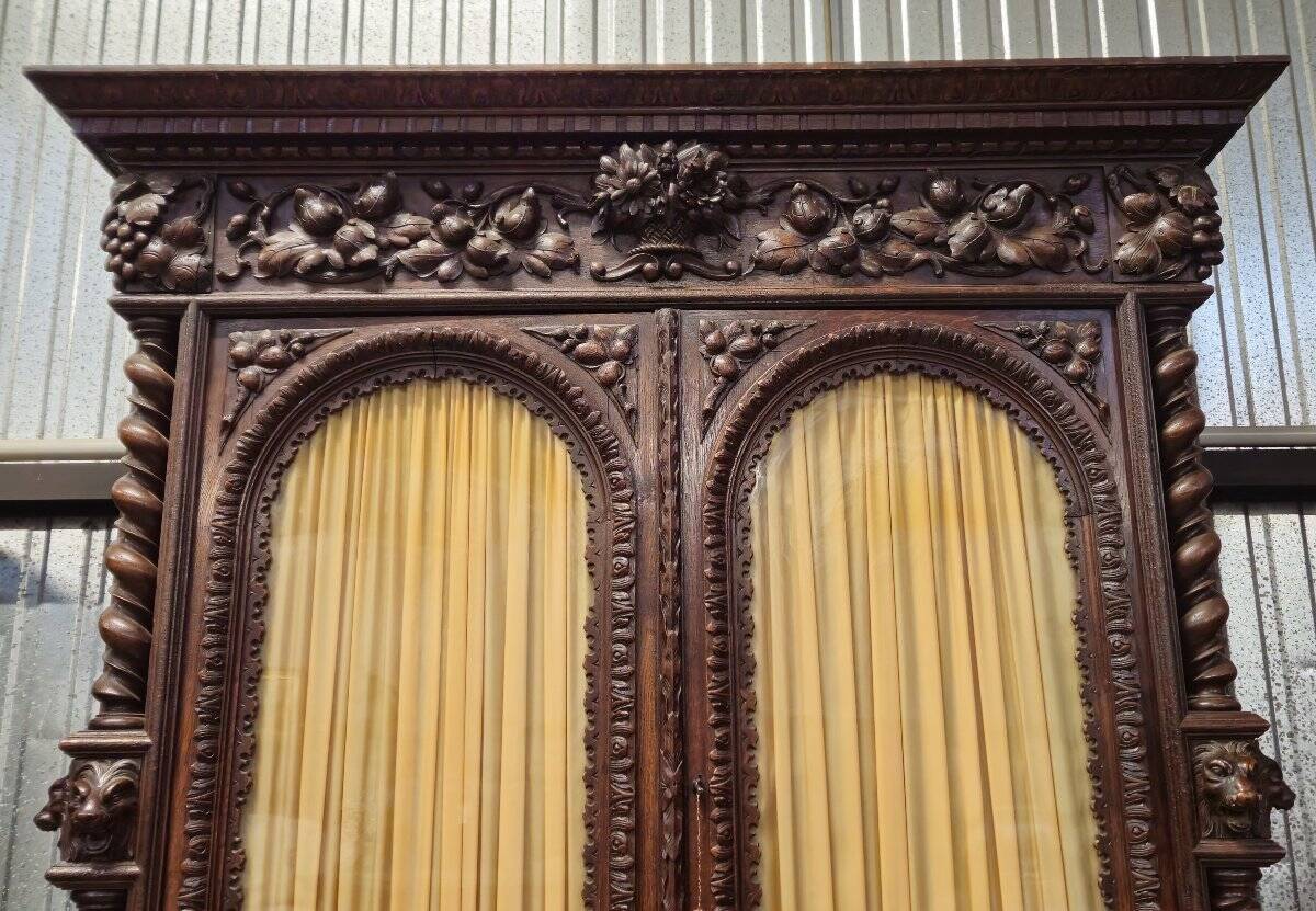 Two-body buffet in solid oak, richly carved in the Renaissance style.