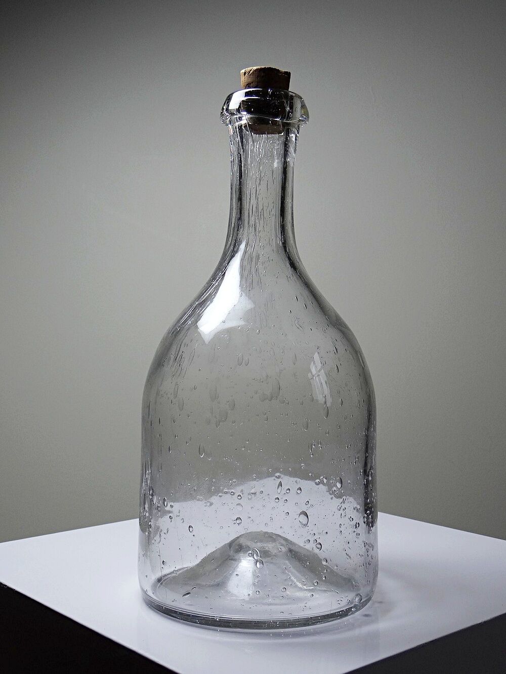 Large antique blown glass bottle with bubbles, early 20th century 1900-1920.