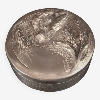 Round Art Nouveau pewter box with floral motifs