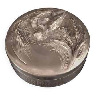 Round Art Nouveau pewter box with floral motifs