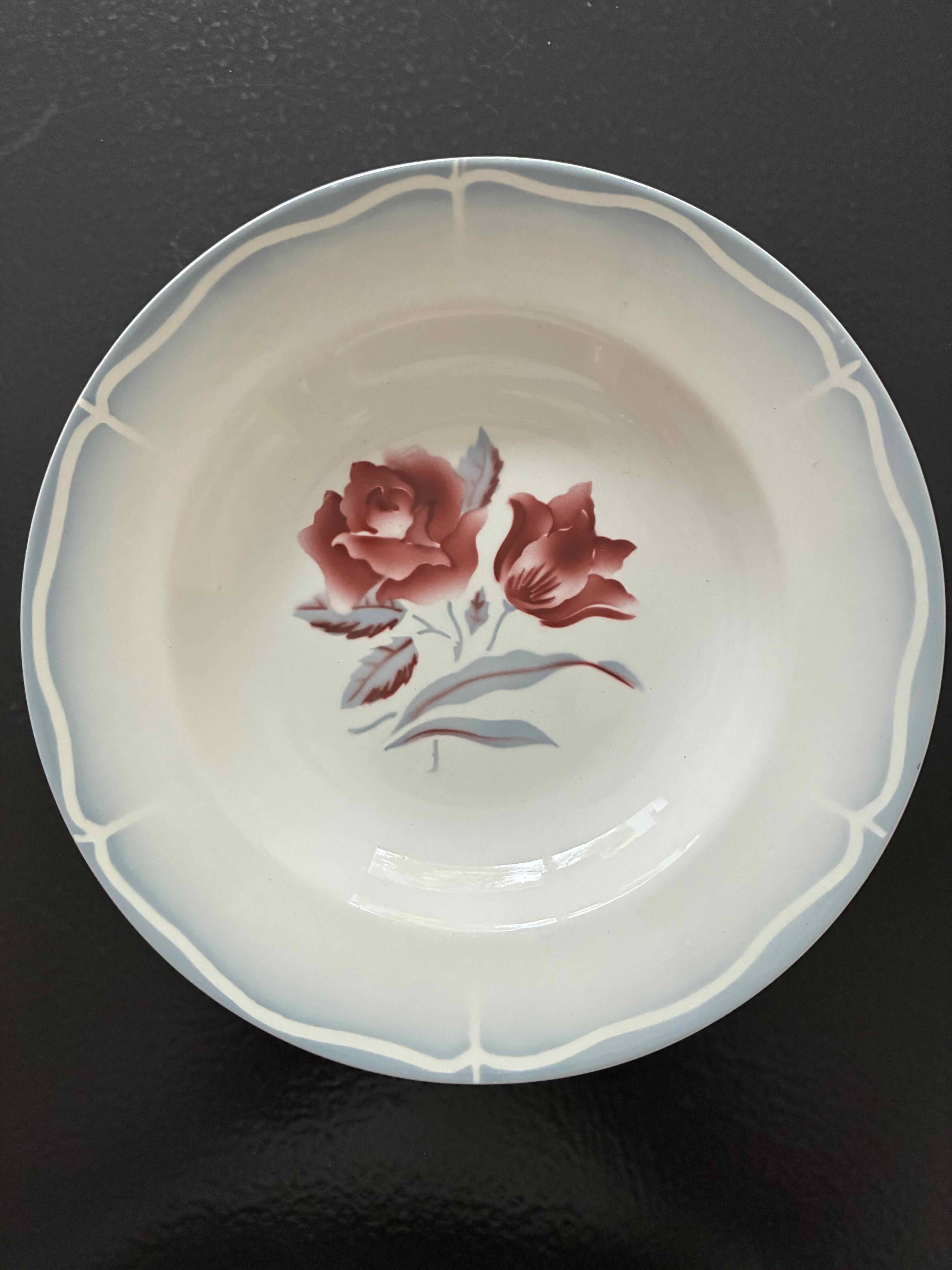 Set of 2 antique deep plates with red flower pattern.