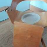 Baumann Baby Coquille children's armchair in bent wood with splayed legs.