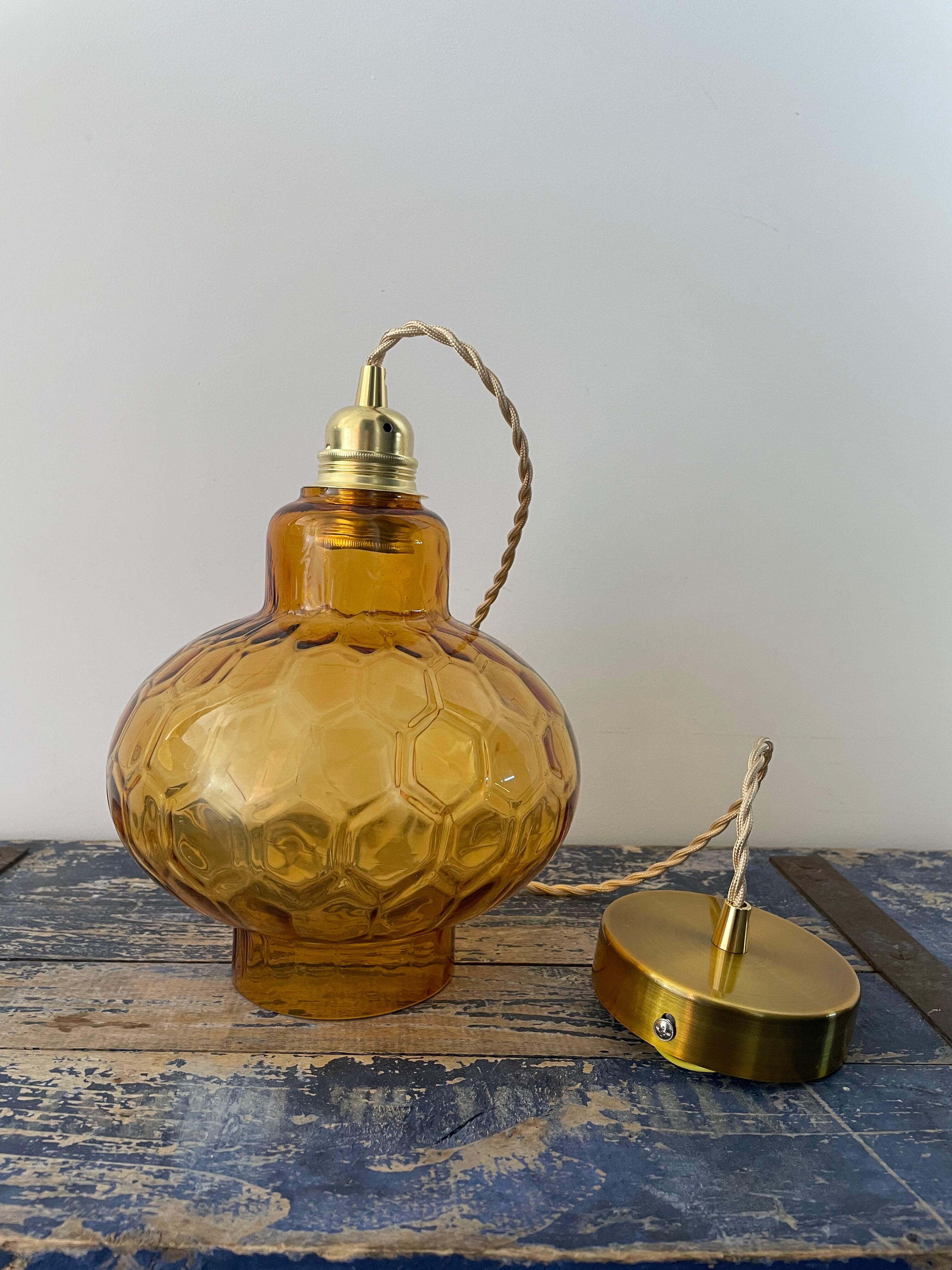 Vintage suspension lamp in electrified amber glass to nine