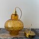Vintage suspension lamp in electrified amber glass to nine