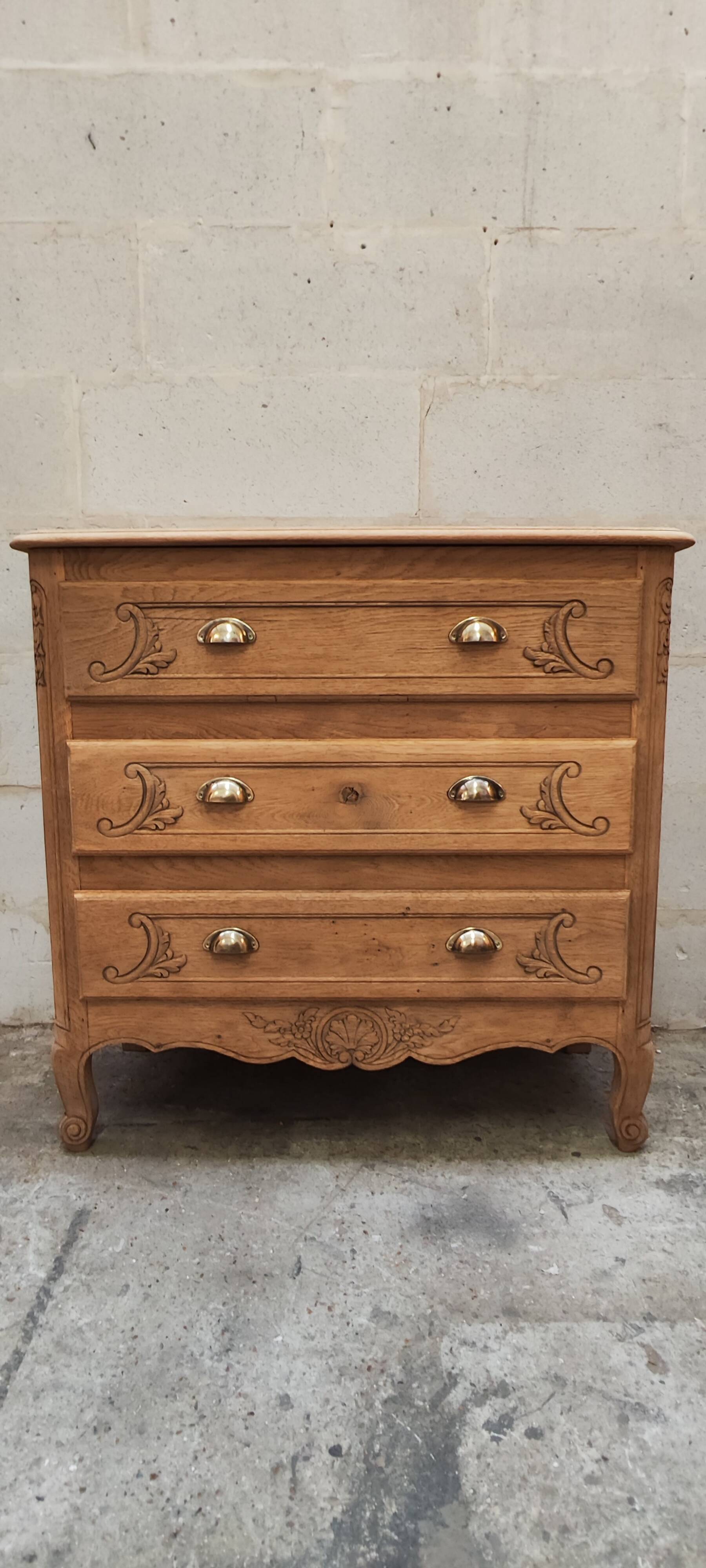 Old chest of drawers with three drawers in raw solid oak