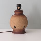 Vintage pottery table lamp with a new custom lampshade.