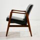 Teak armchair with leather upholstery
