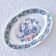Large vintage Italian oval dish decorated with birds, flowers and fruits