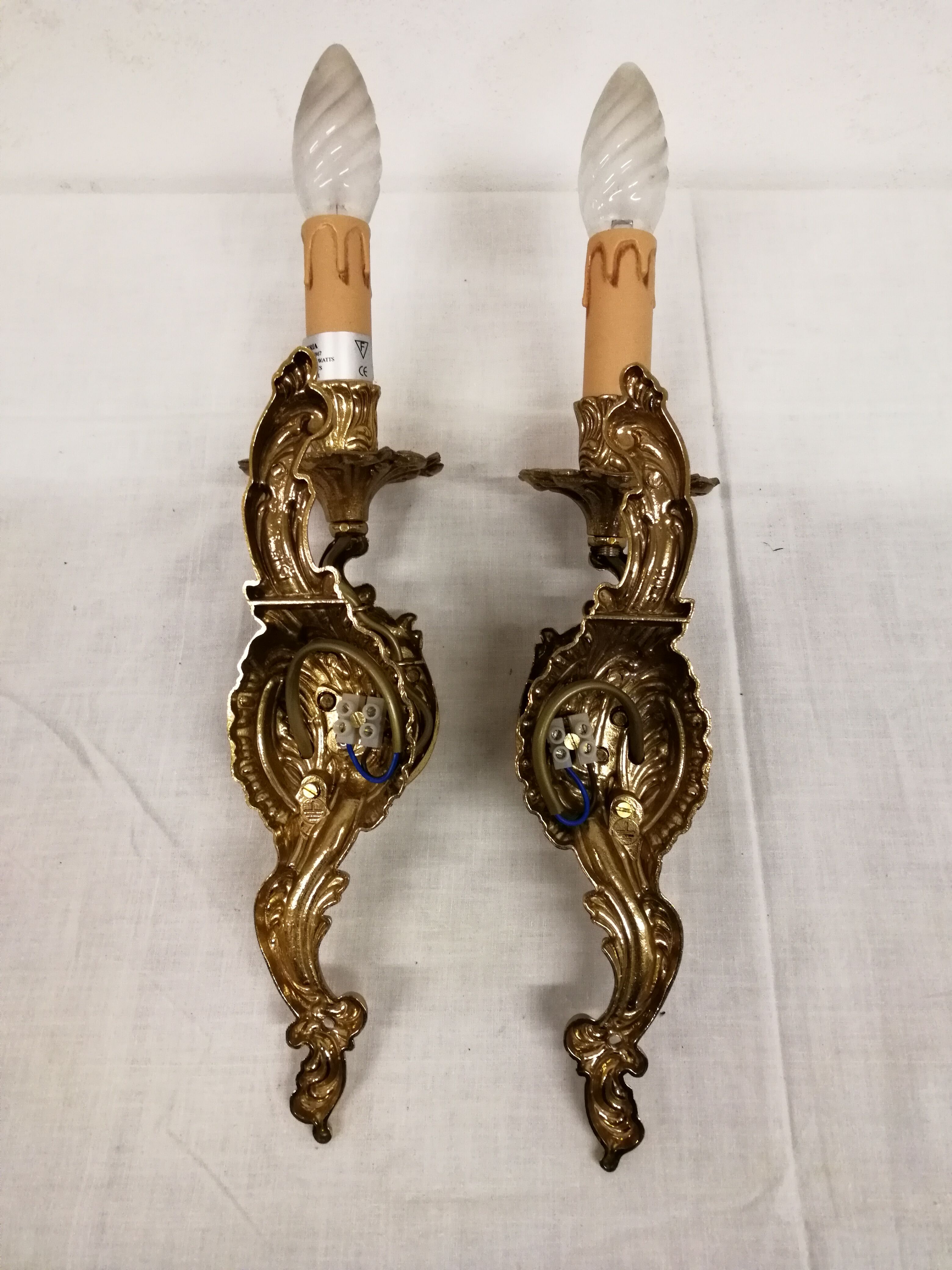 Pair of bronze wall lamps