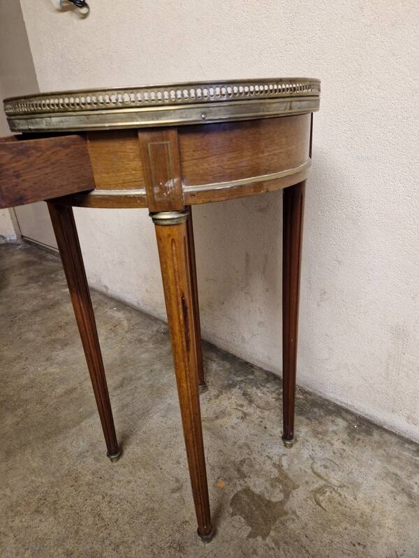 Louis XVI style bouillotte table in mahogany with a grey marble top.