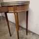 Louis XVI style bouillotte table in mahogany with a grey marble top.