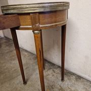 Louis XVI style bouillotte table in mahogany with a grey marble top.