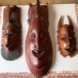 3 masques africains en bois sculpté