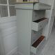 Louis Philippe style chest of drawers, 7 drawers, in verdigris, wooden top