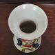 Finely hand-painted porcelain vase with toucans, circa 1950