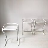 Set of three white and chrome bar stools by Thema Italy to the 1970s