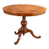 Antique round walnut table with a baluster central leg, Italy, 19th century.
