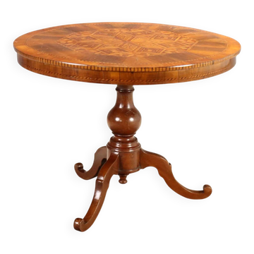 Antique round walnut table with a baluster central leg, Italy, 19th century.