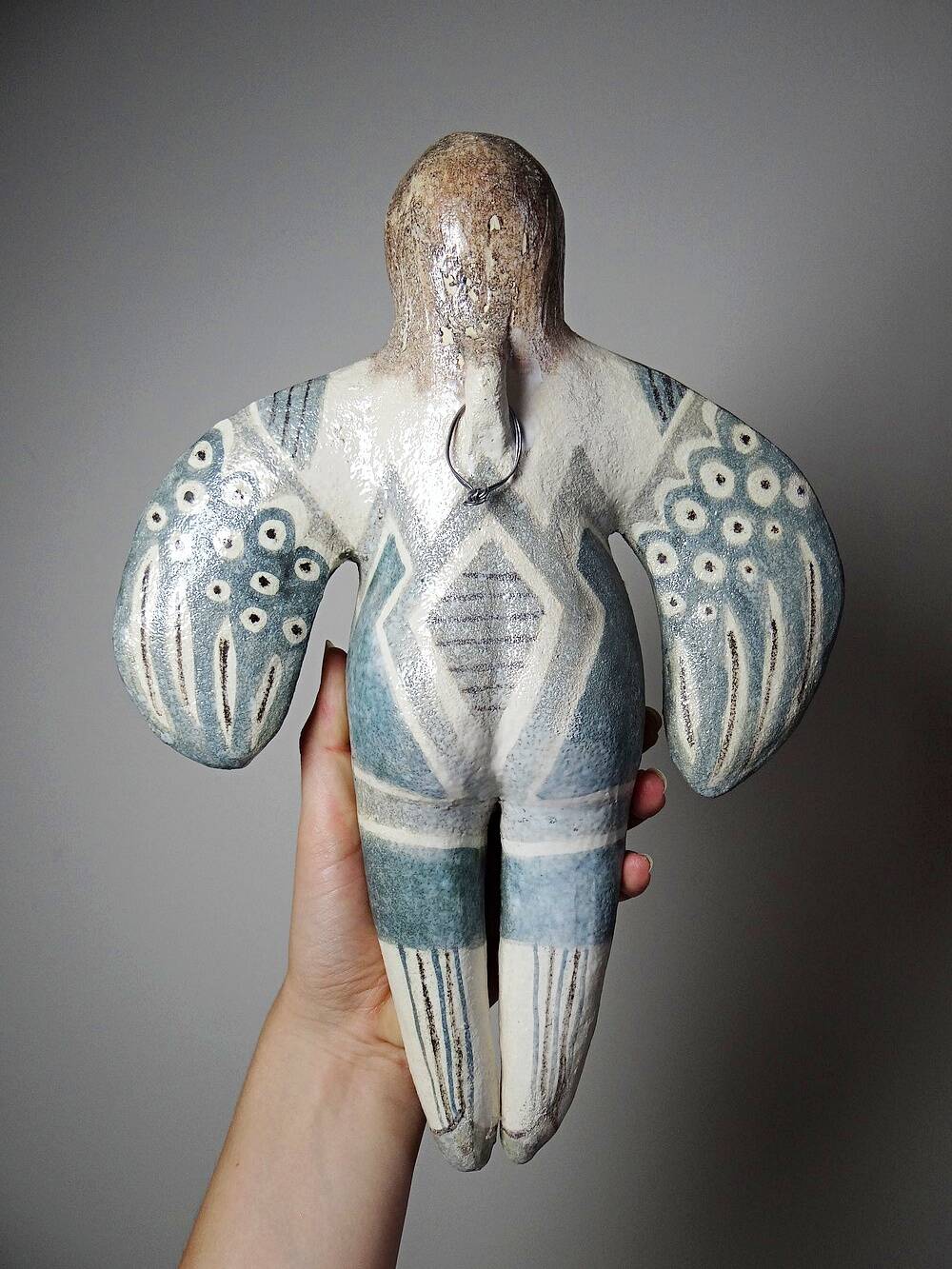 Vintage stylised mermaid ceramic wall sculpture from an art studio.