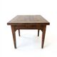 Rustic solid wood table: Elegance and functionality for your family meals, 19th century.