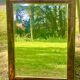 Grand miroir moulure doucine loupe d'orme, miroir biseauté