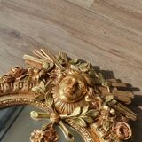 Gilded mirror signed Vincenzo Fancelli