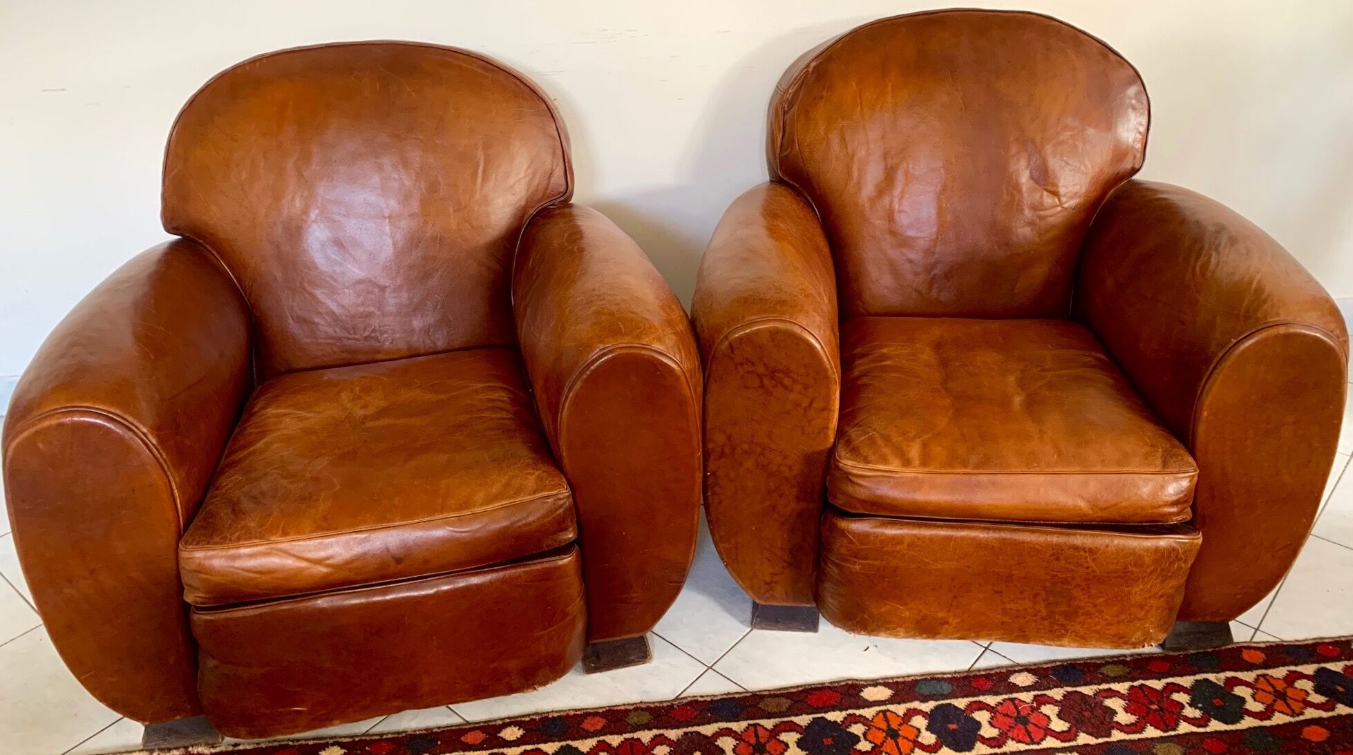 Pair of leather club chairs