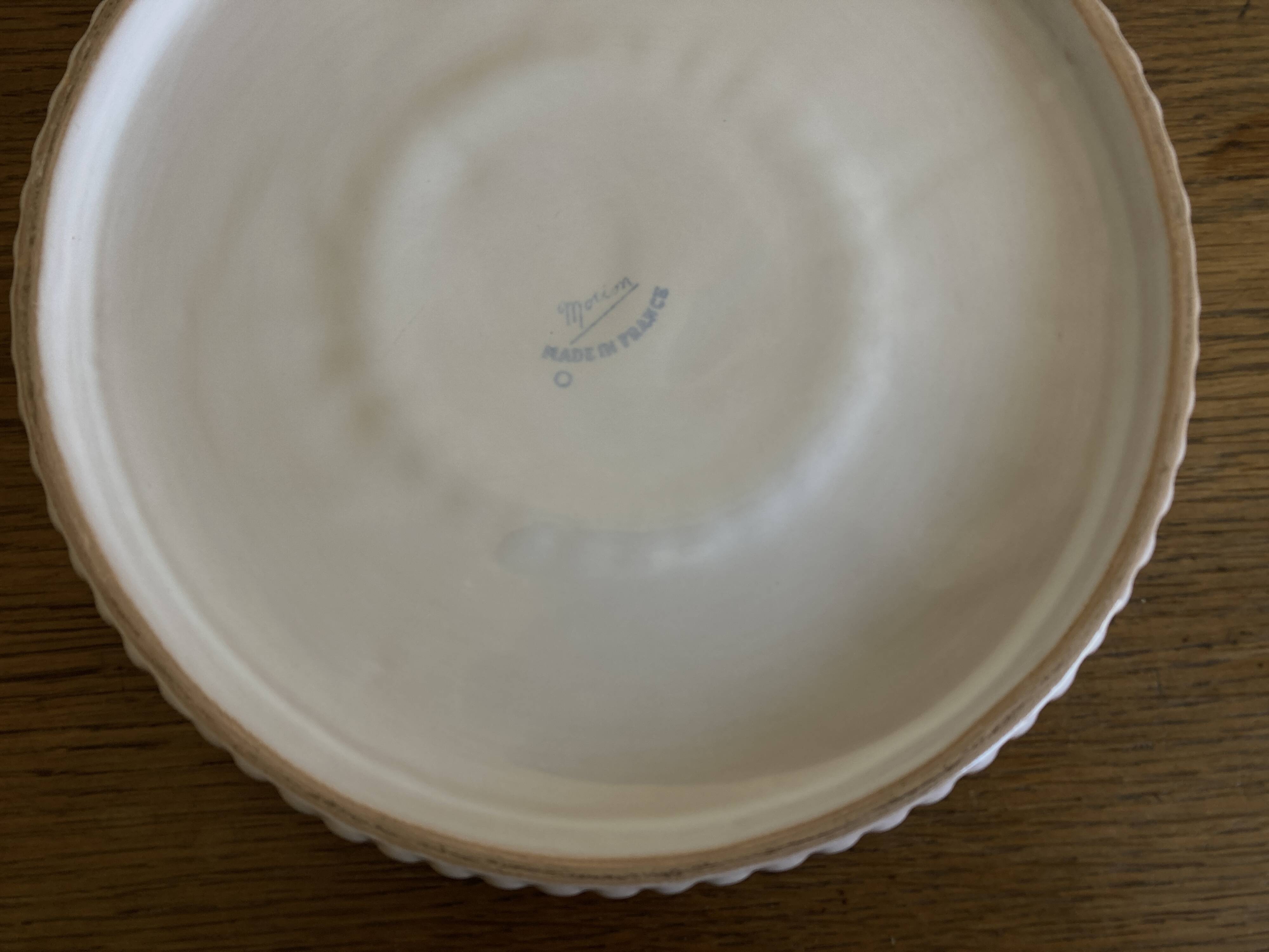 Pierre Motton glazed earthenware scalloped trivet for Gien