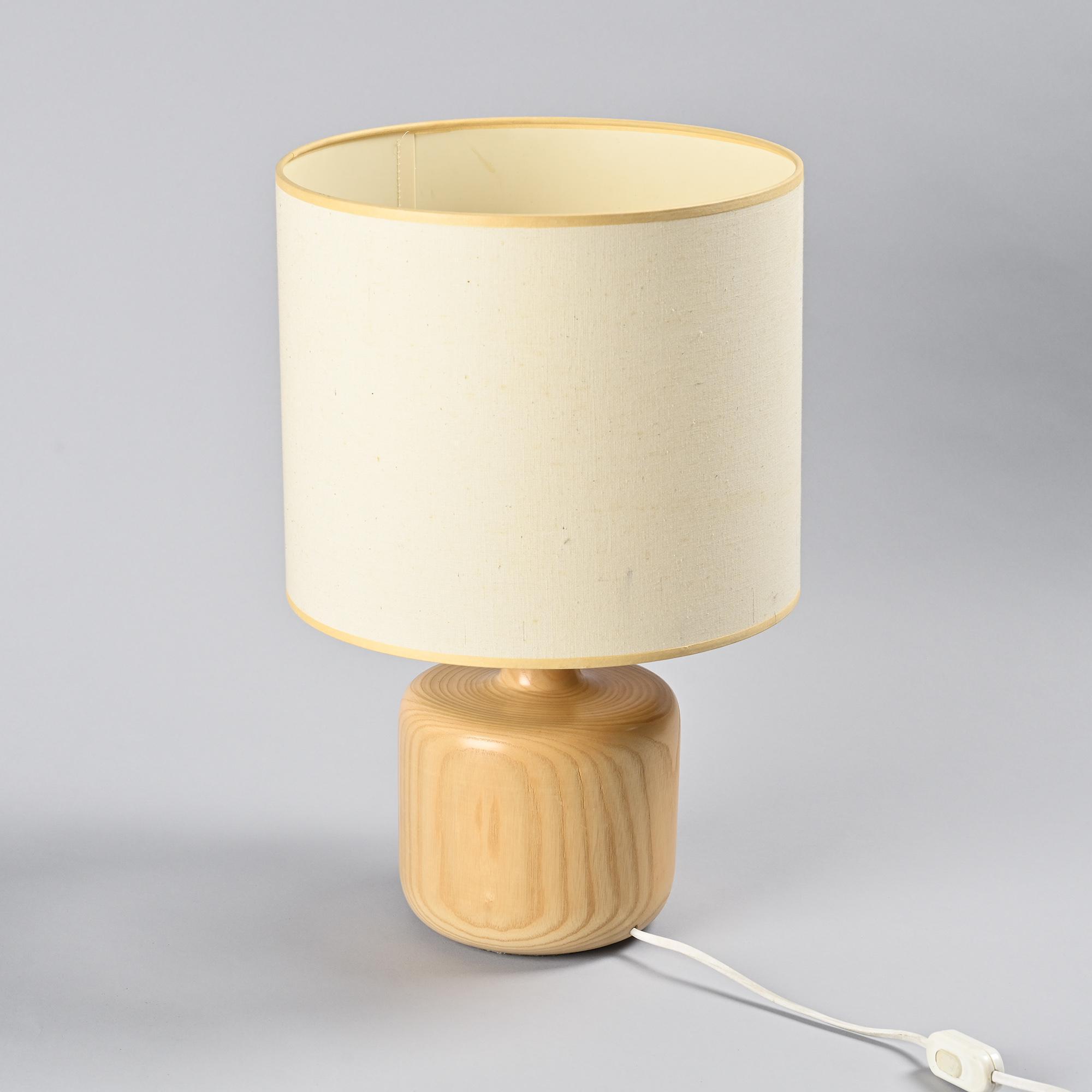 Table lamp in solid elm, France, circa 1970.