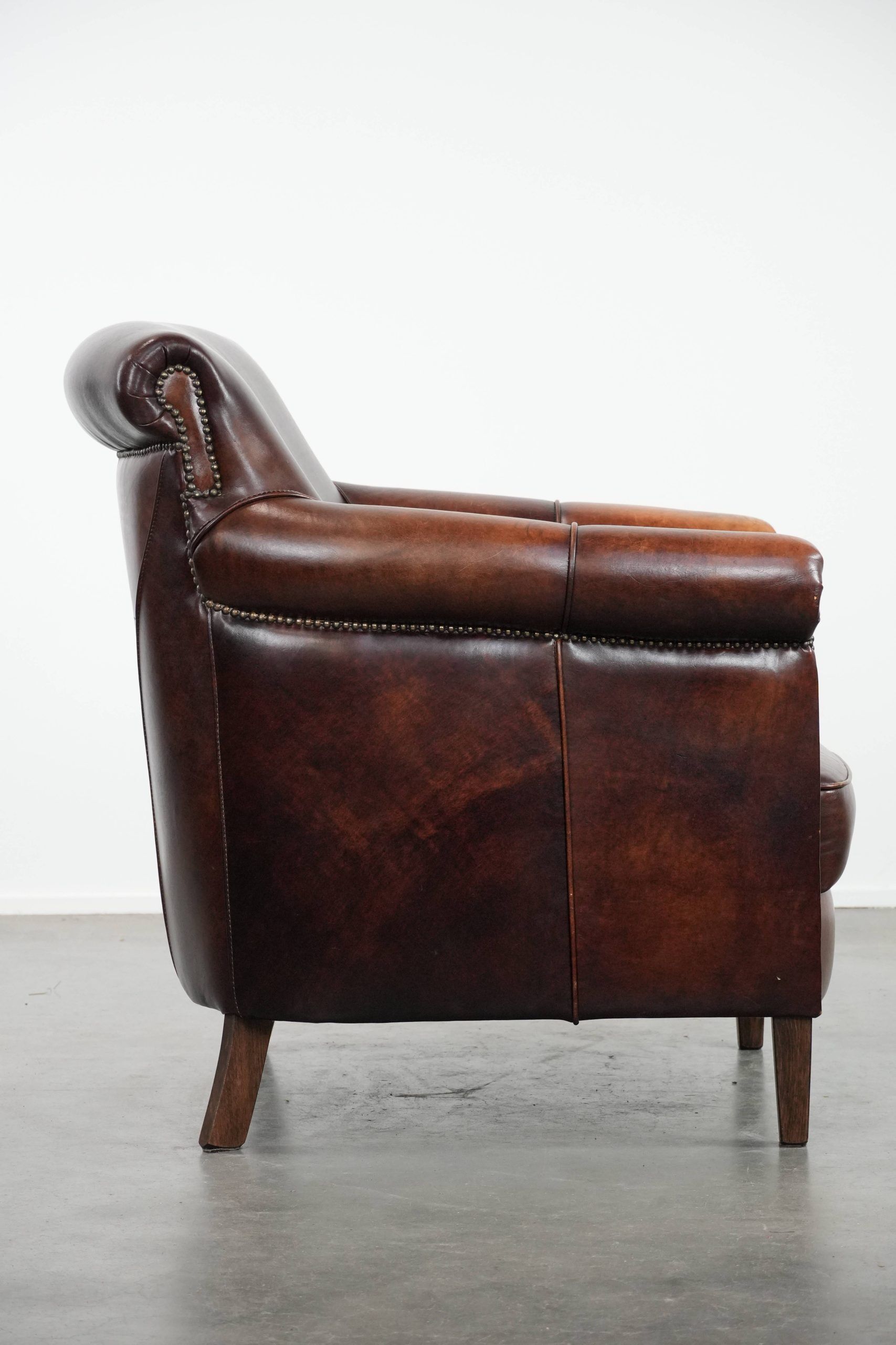 Characterful and comfortable cowhide leather armchair