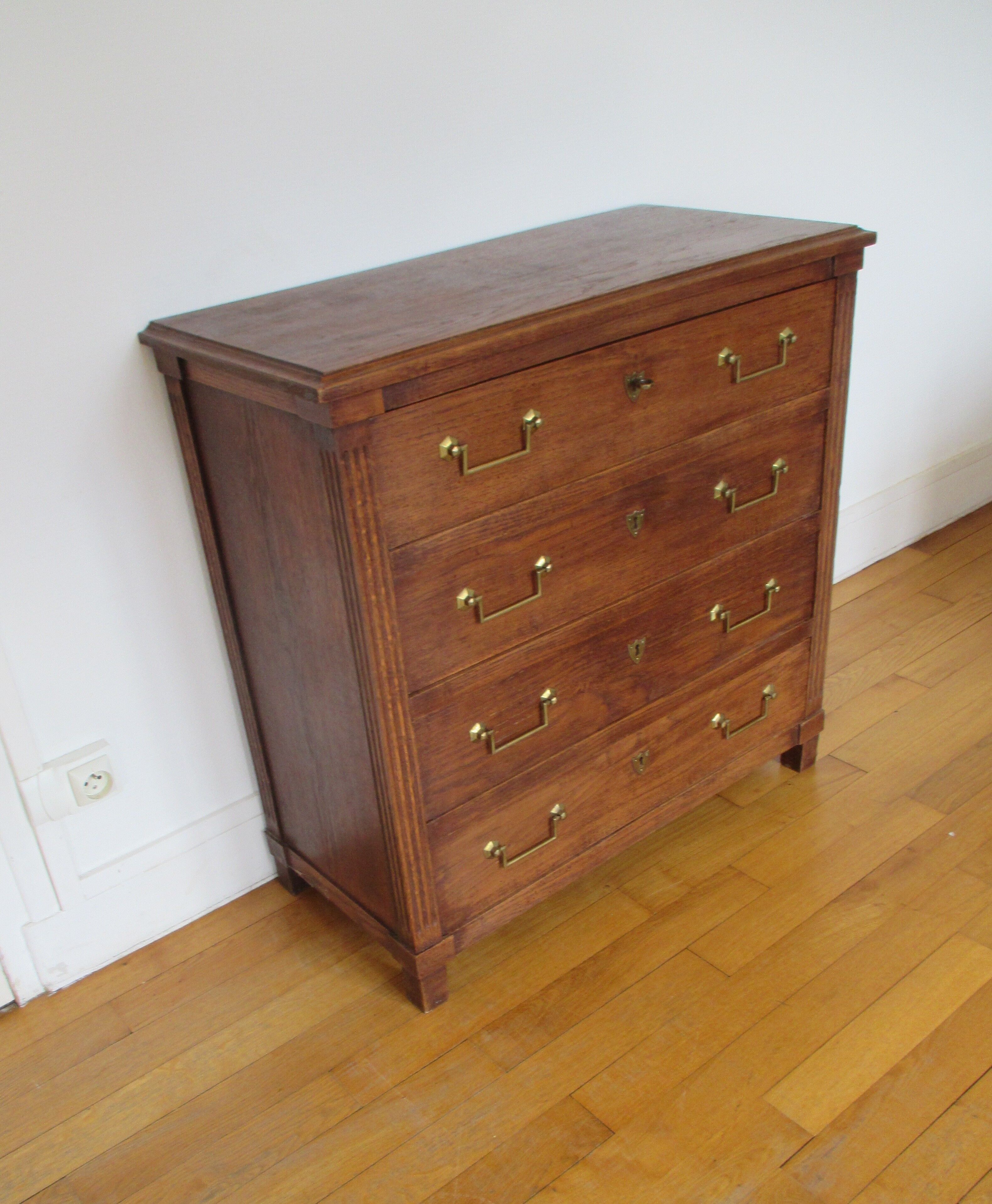 Oak chest of drawers and brass handles