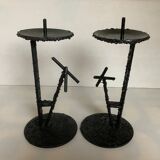 Pair of black metal candlesticks
