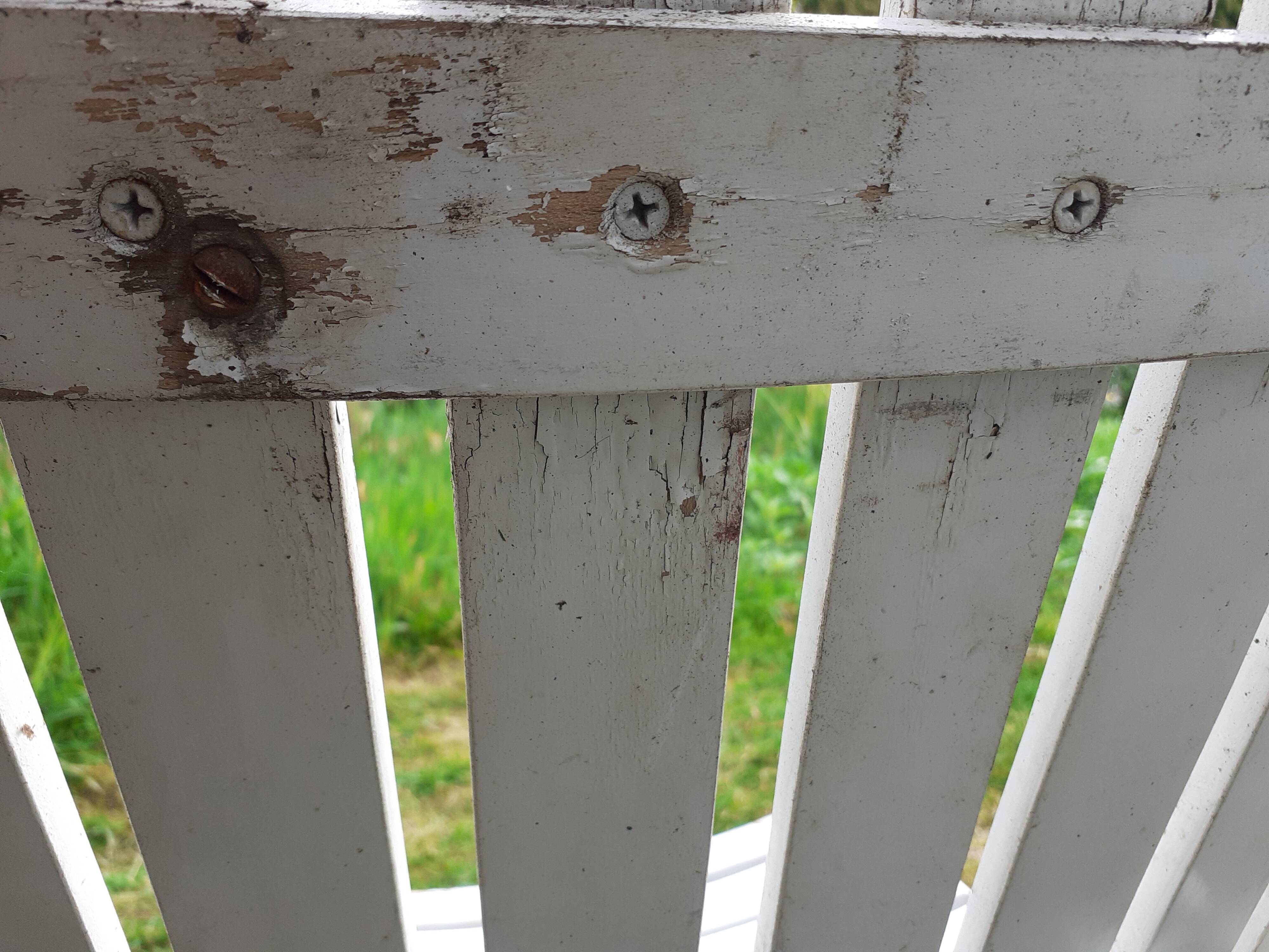 Pair of iron and old wood garden chairs