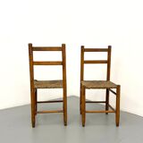 Pair of vintage wooden chairs with mulched seat