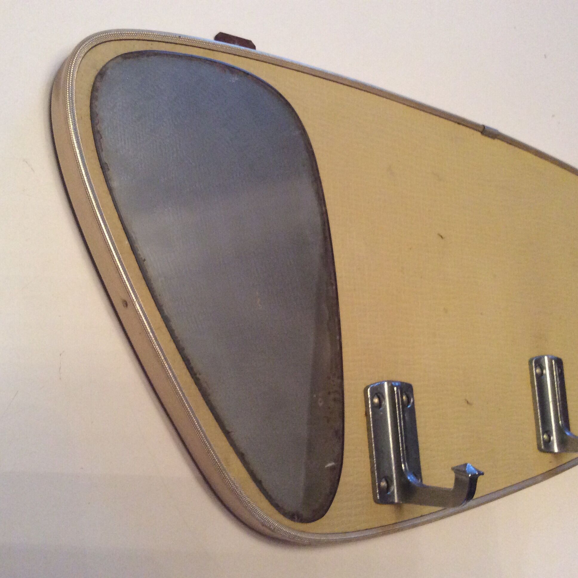 Asymmetrical coat holder from the 1950s