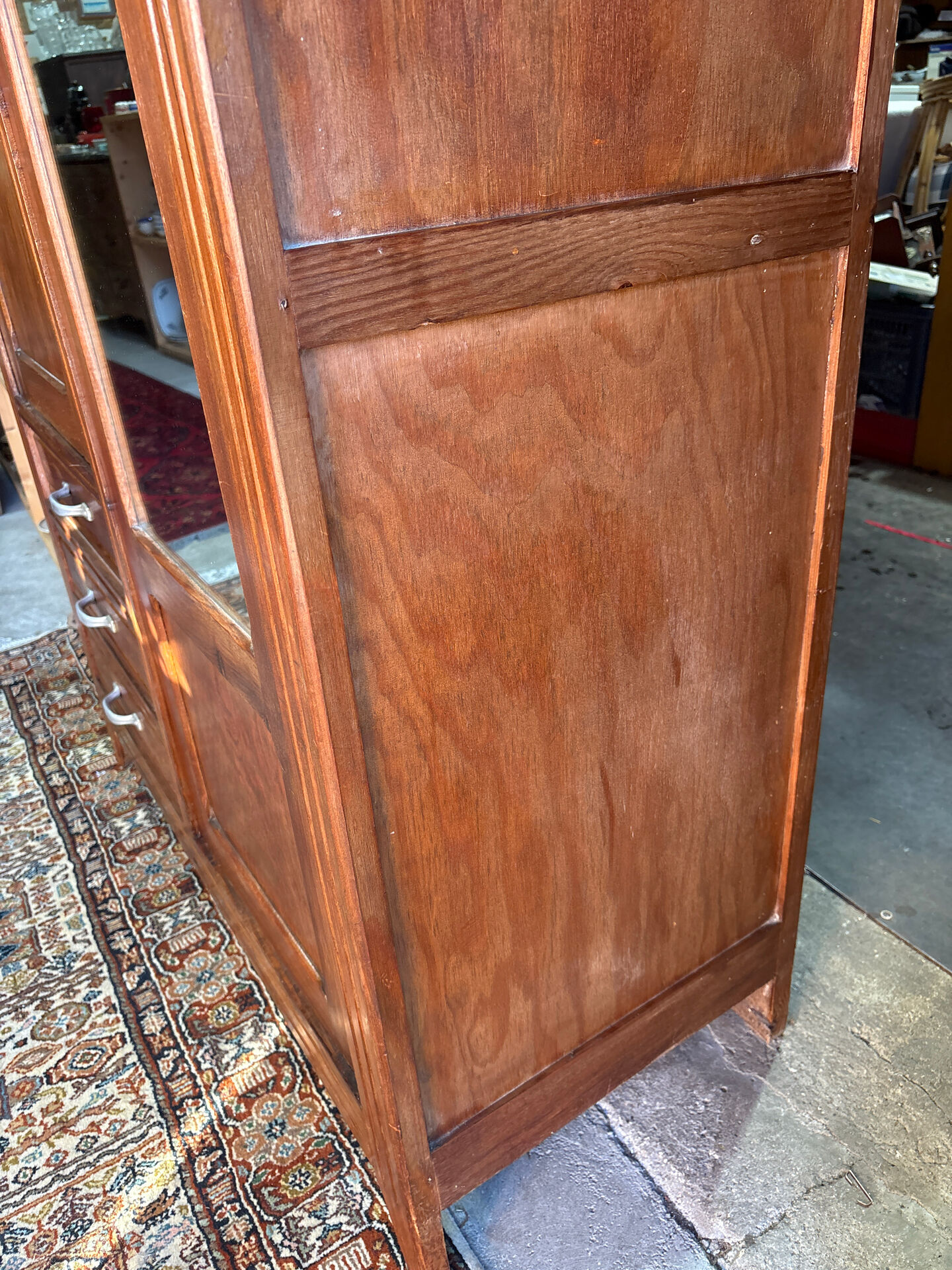 Antique Parisian wardrobe with mirror, hanging space and drawers.