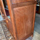 Antique Parisian wardrobe with mirror, hanging space and drawers.