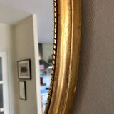 Oval gilded mirror baroque style