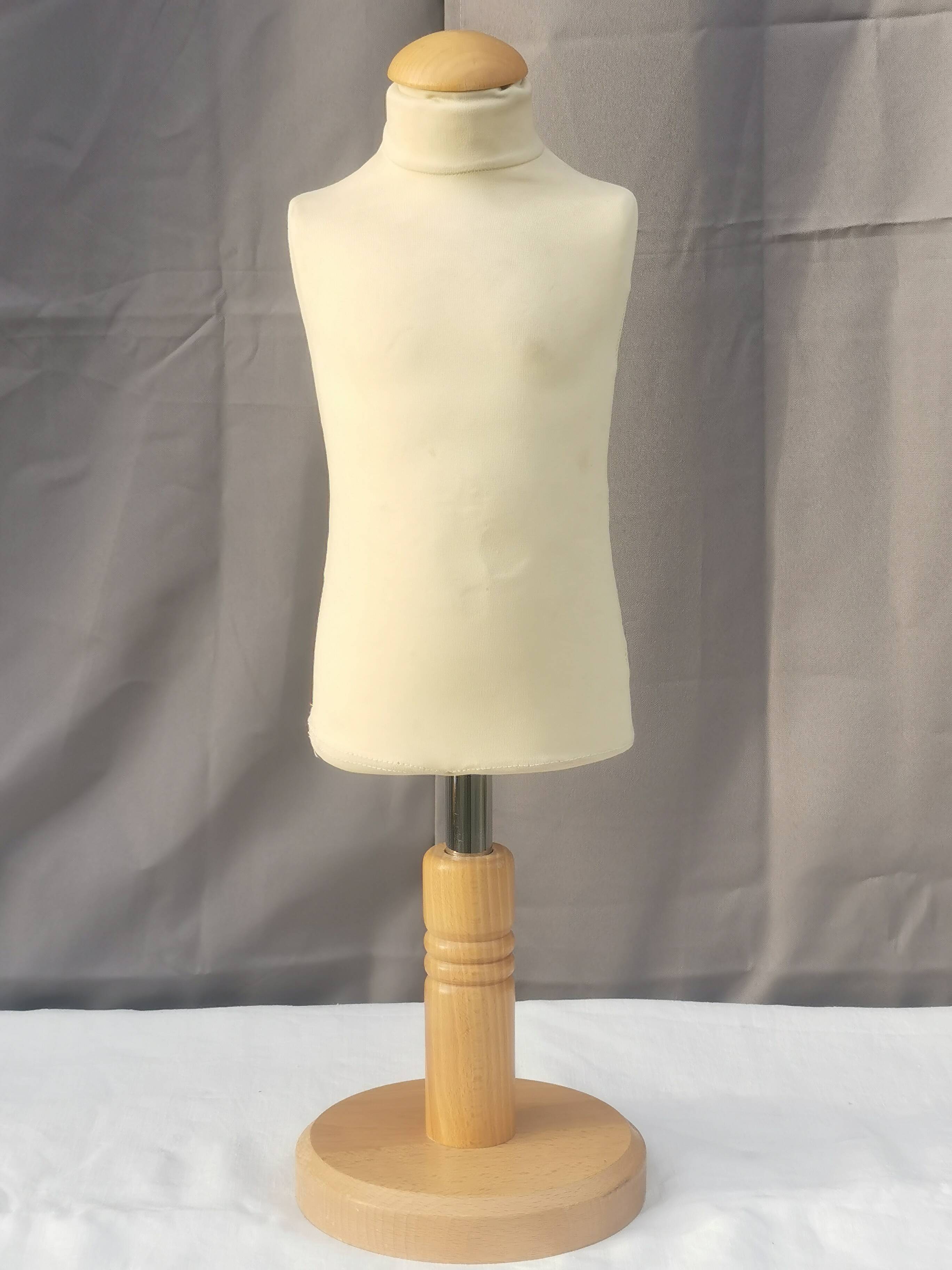 "Child bust" mannequin on base