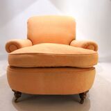 Deep seated armchair in the style of Howard & Sons