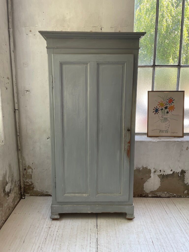 Blue patinated cap cabinet