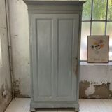 Blue patinated cap cabinet