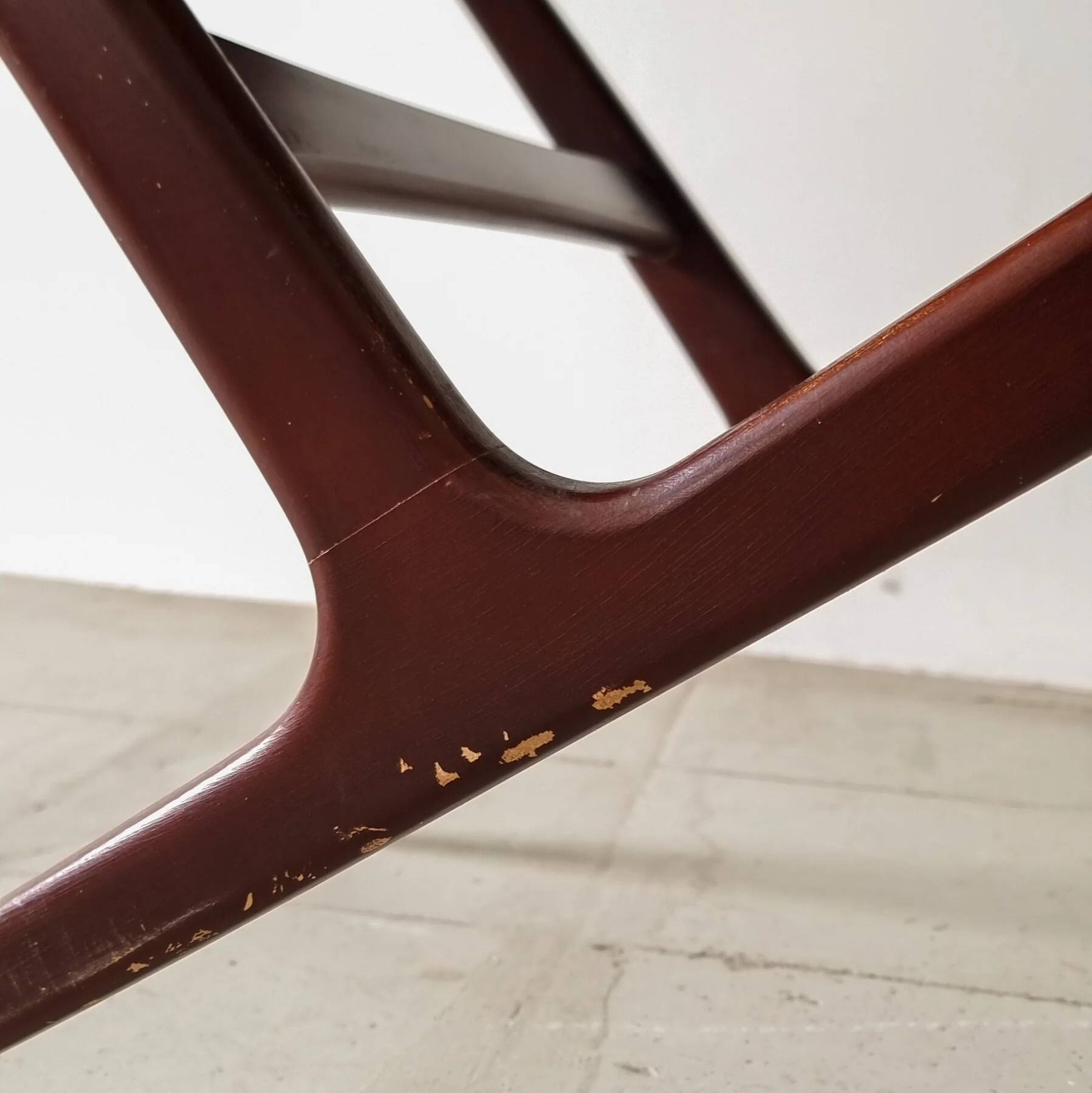 1950s Ilse Möbel coffee table with a black glass top.