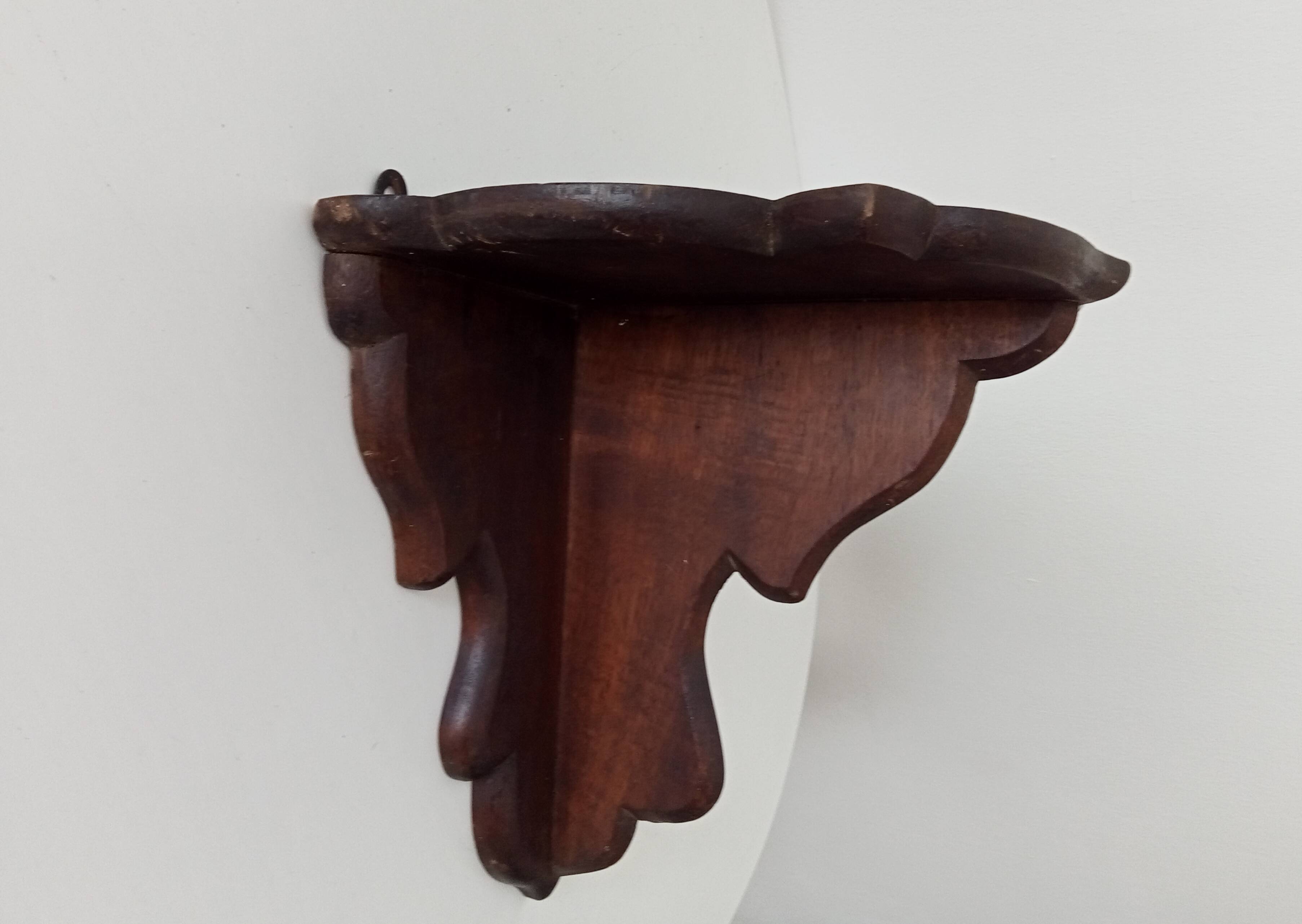 Pair of antique carved wooden shelves